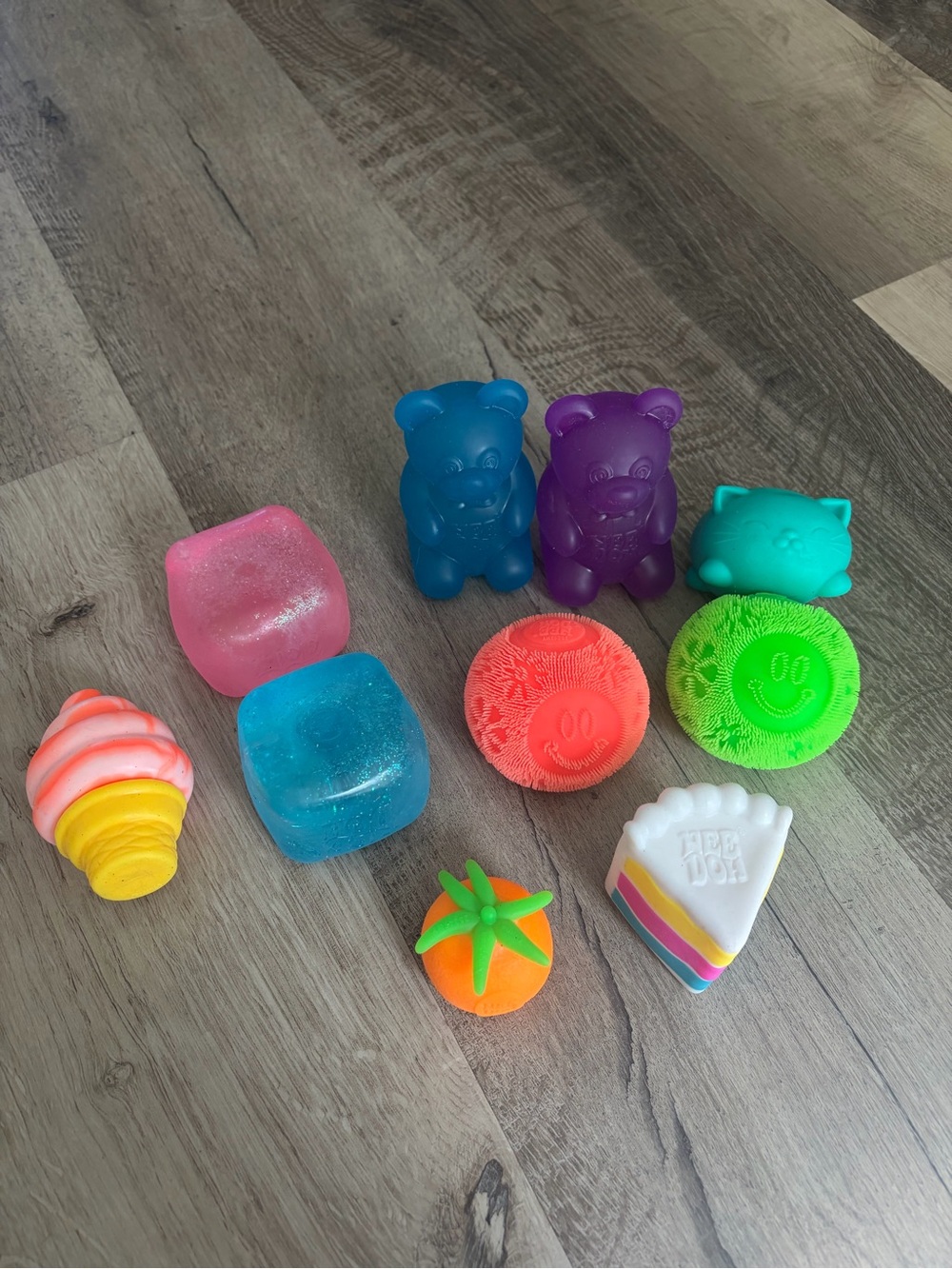 Authentic NeeDoh Squishy Lot of 10 – Nice Cubes, Gummy Bears, Fuzz Balls & More